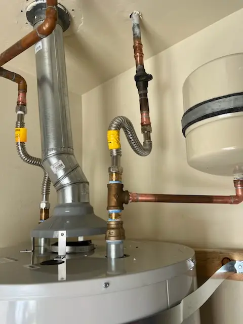Water heater installation and plumbing repair in West Suffield